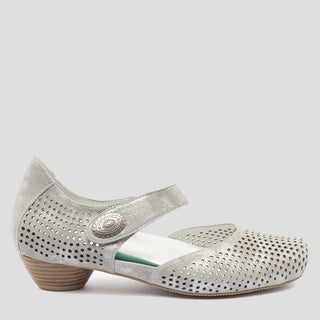 Silver shoe with cut-out design and brown sole on a light gray background