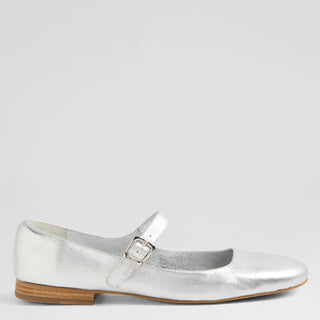 Silver flat shoe with a wooden sole on a light gray background